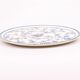 Vintage white plate with blue patterns in Victoria porcelain.