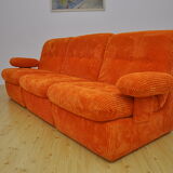 Orange corduroy modular sofa, 1970s.