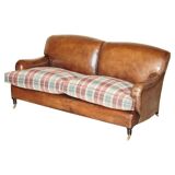 George Smith Signature Scroll leather canapé with tartan Scottish wool cushions.