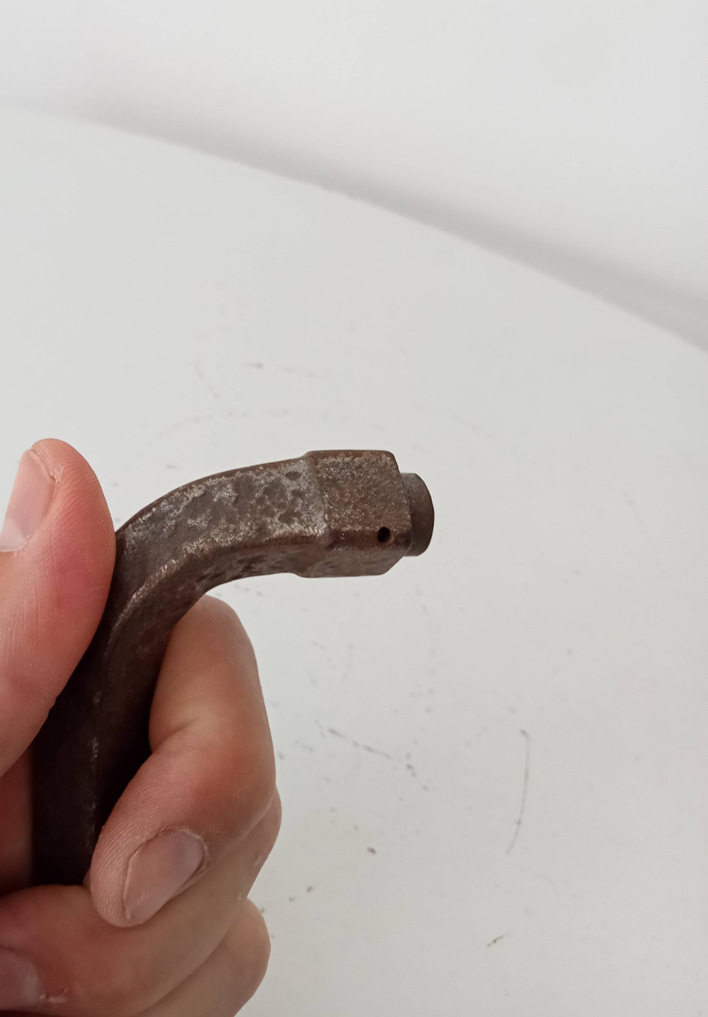19th-century antique door handle in forged steel