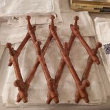 Extendable wall coat rack