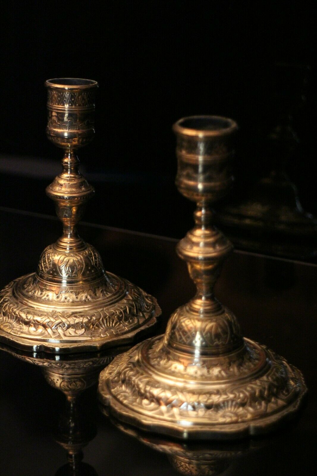 Pair of 19th bronze candlesticks with Regency-style chiseled decoration