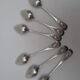 Suite of 6 small silver dessert spoons, medallion decoration