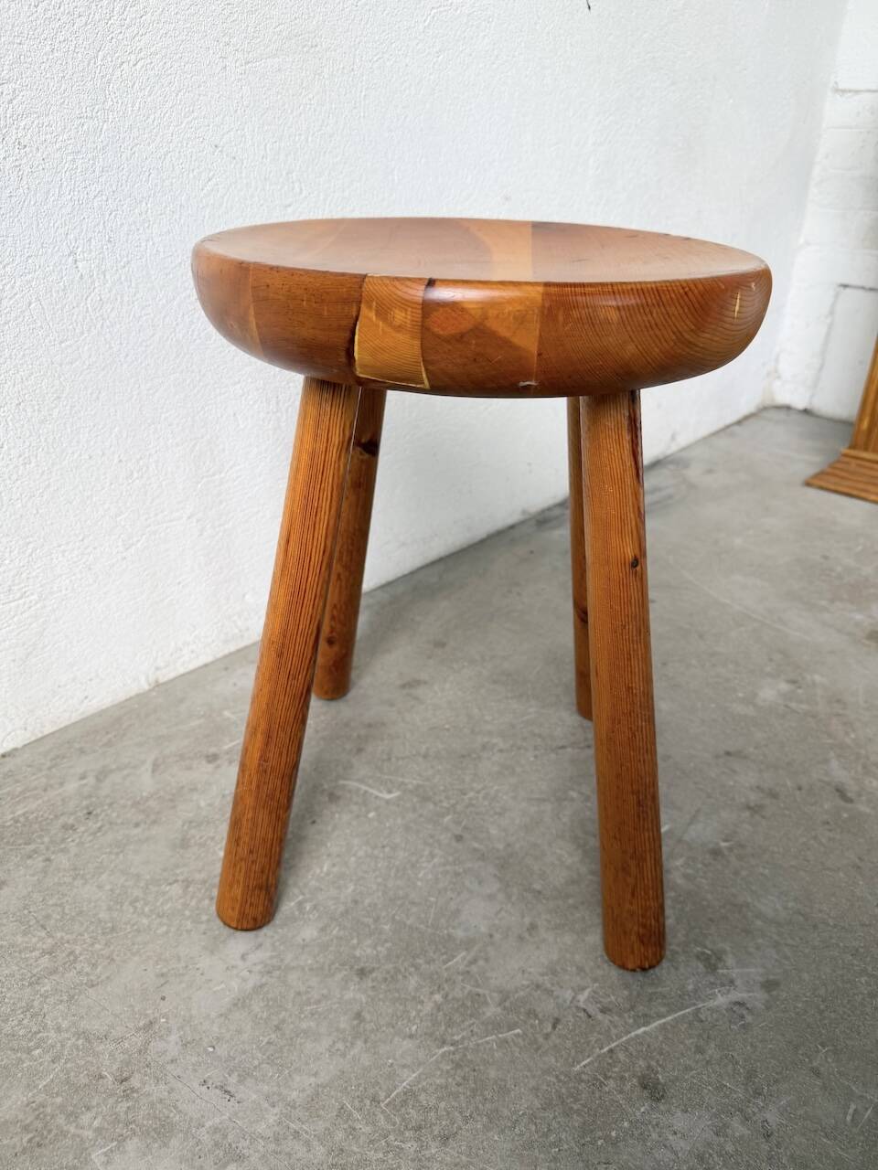 Pine stool assigned to Charlotte Perriand for Les Arcs.