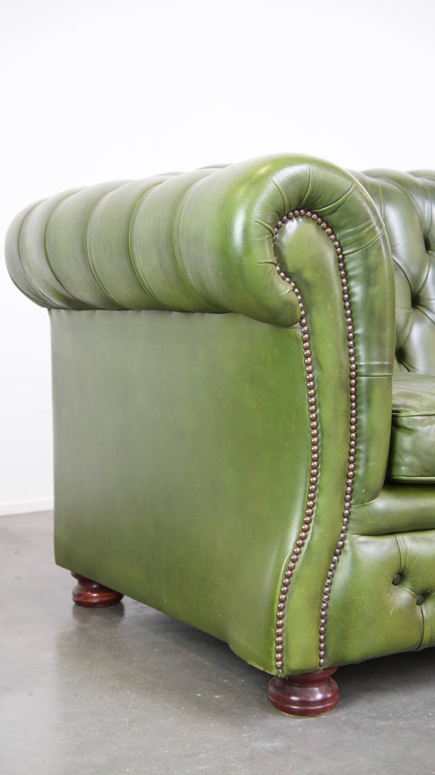 Stylish, English green cow leather spacious 2.5 seater chesterfield sofa