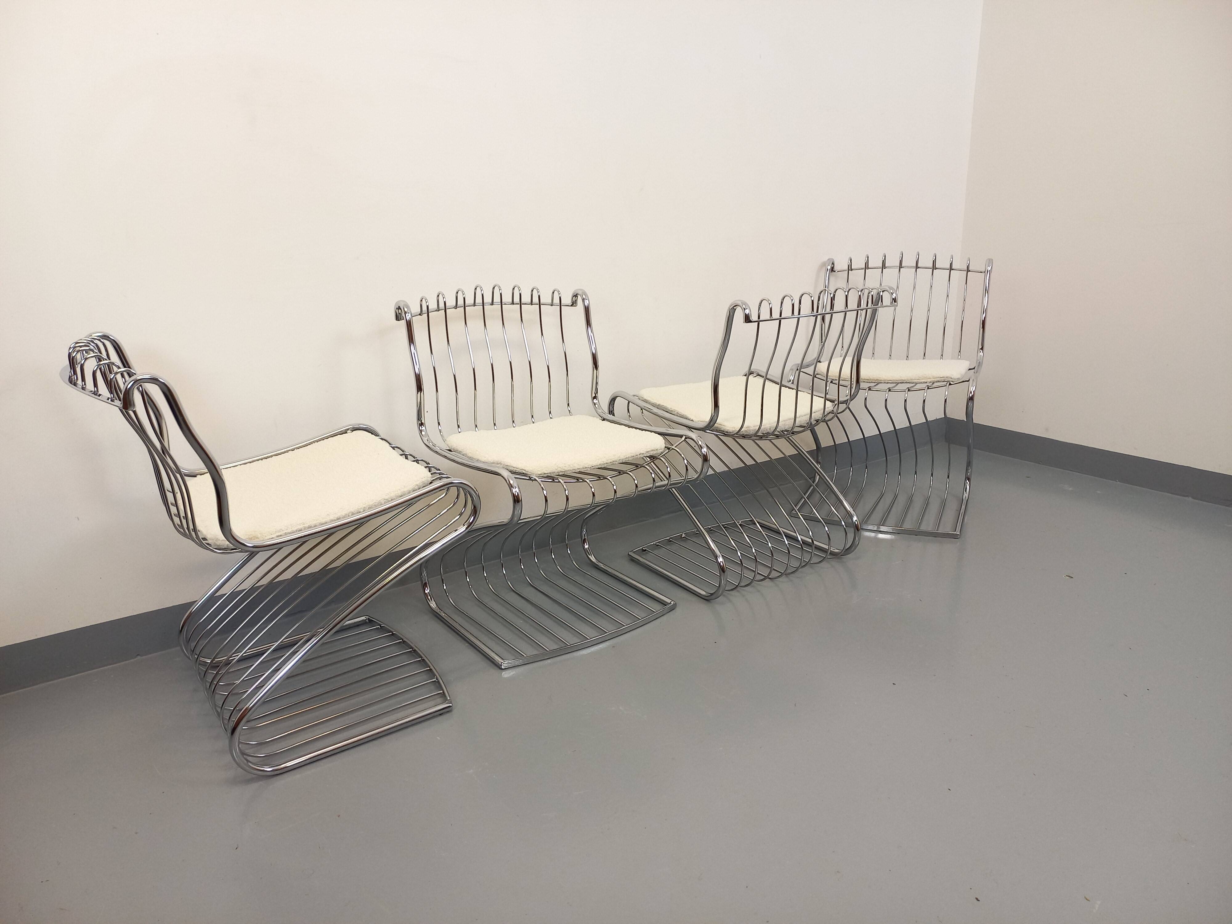 Set of 4 vintage Italian chairs by Gastone Rinaldi in chrome metal.