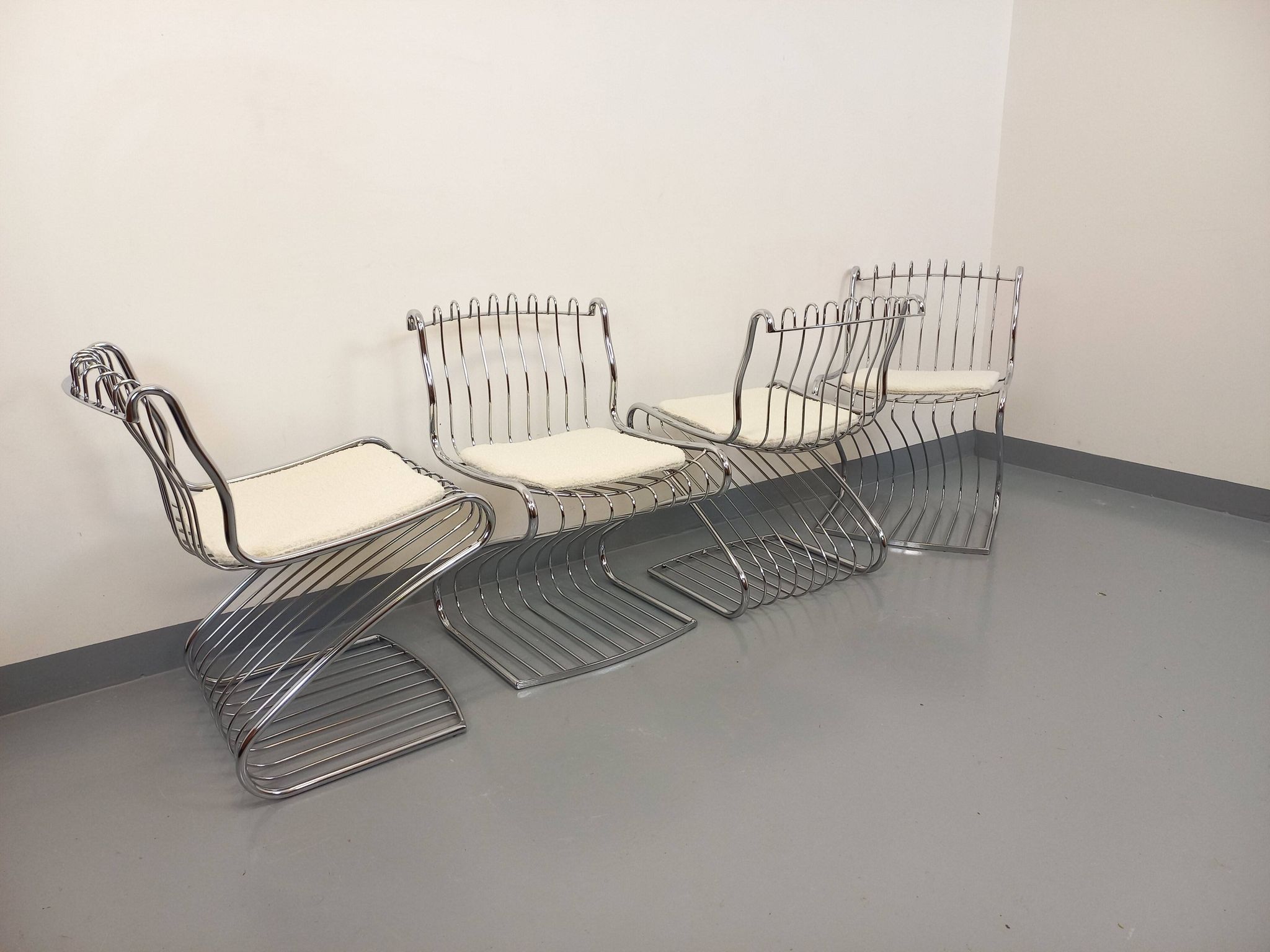 Set of 4 vintage Italian chairs by Gastone Rinaldi in chrome metal.