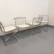 Set of 4 vintage Italian chairs by Gastone Rinaldi in chrome metal.