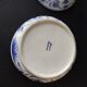 Hand-painted blue porcelain candy in Thailand