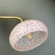 Vintage glass wall lamp with a white Clichy shade.