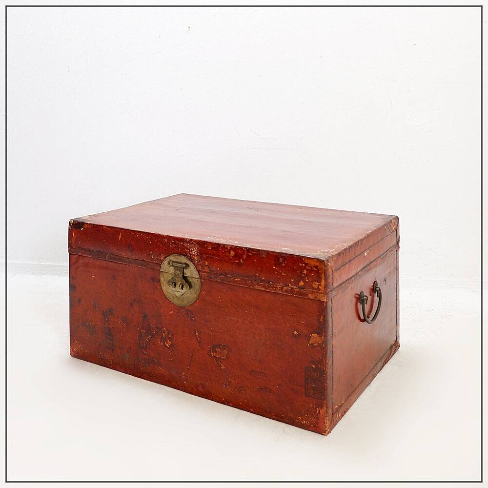 Chinese red lacquered leather trunk from the early 20th century.