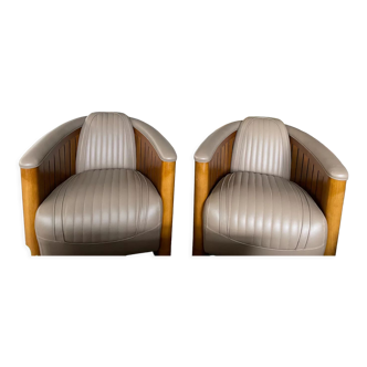 Pair of leather and wood club chairs