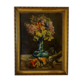 Still life with vase and bouquets of flowers