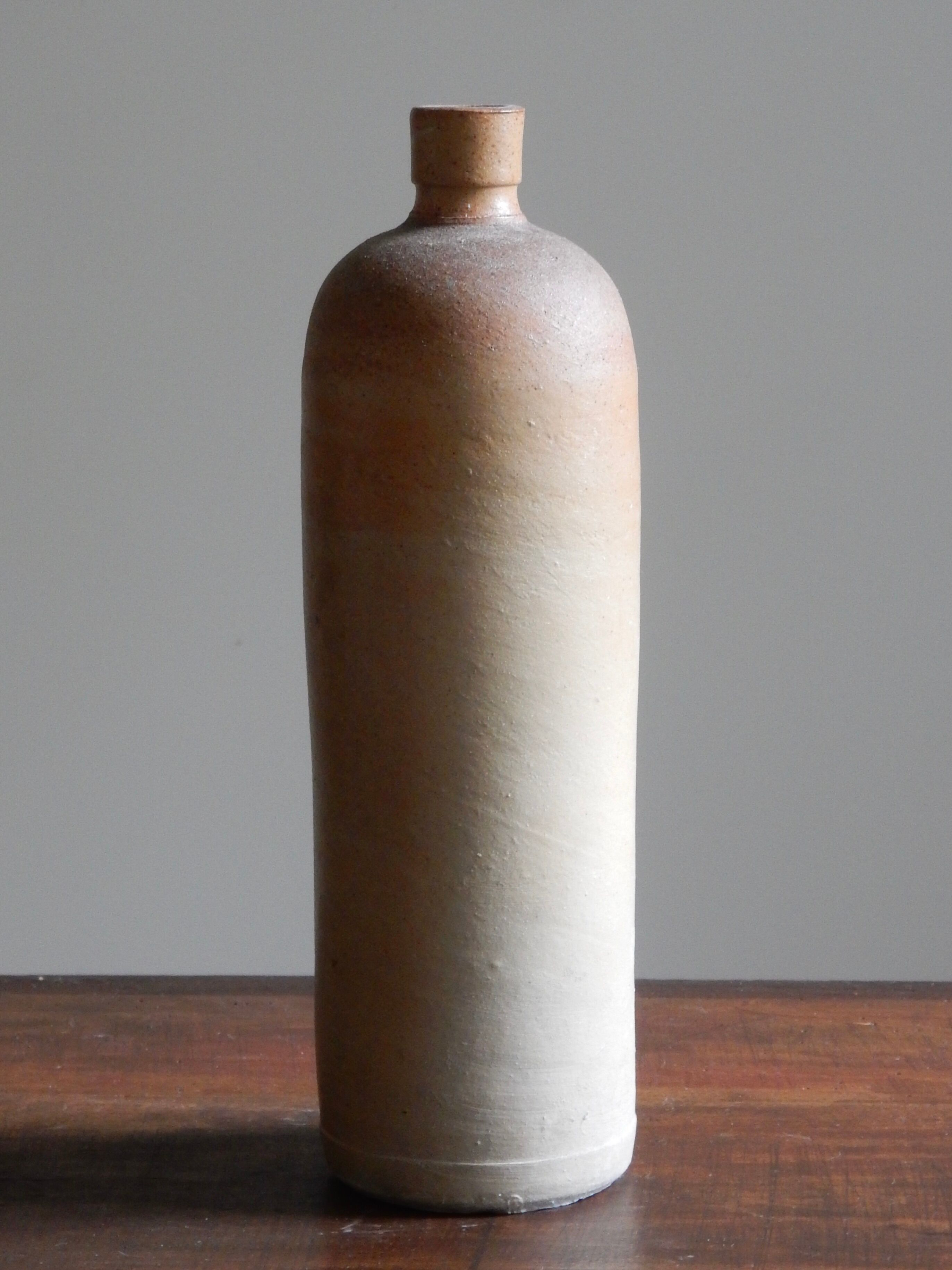 Old matte sandstone bottle