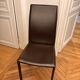 Many brown leather chairs "Roche Bobois"