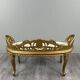 Louis XV style bench in carved and gilded wood, 20th century.
