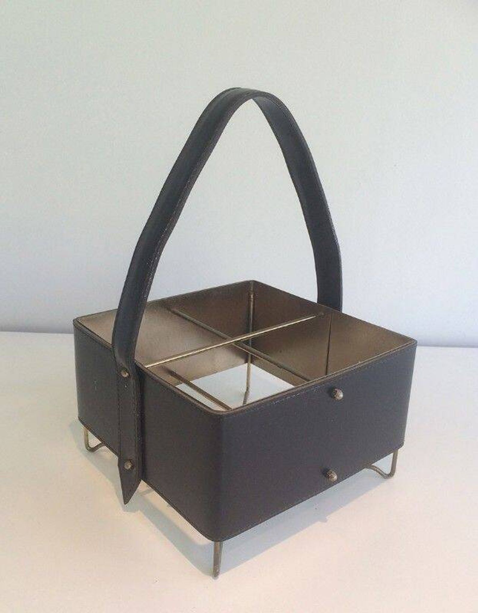 Porte-bouteilles en cuir, laiton et métal doré