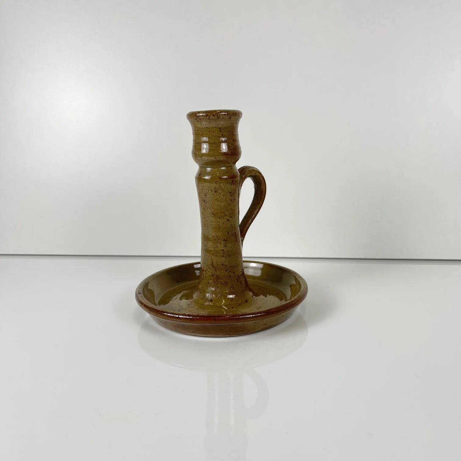 Stoneware hand candlestick