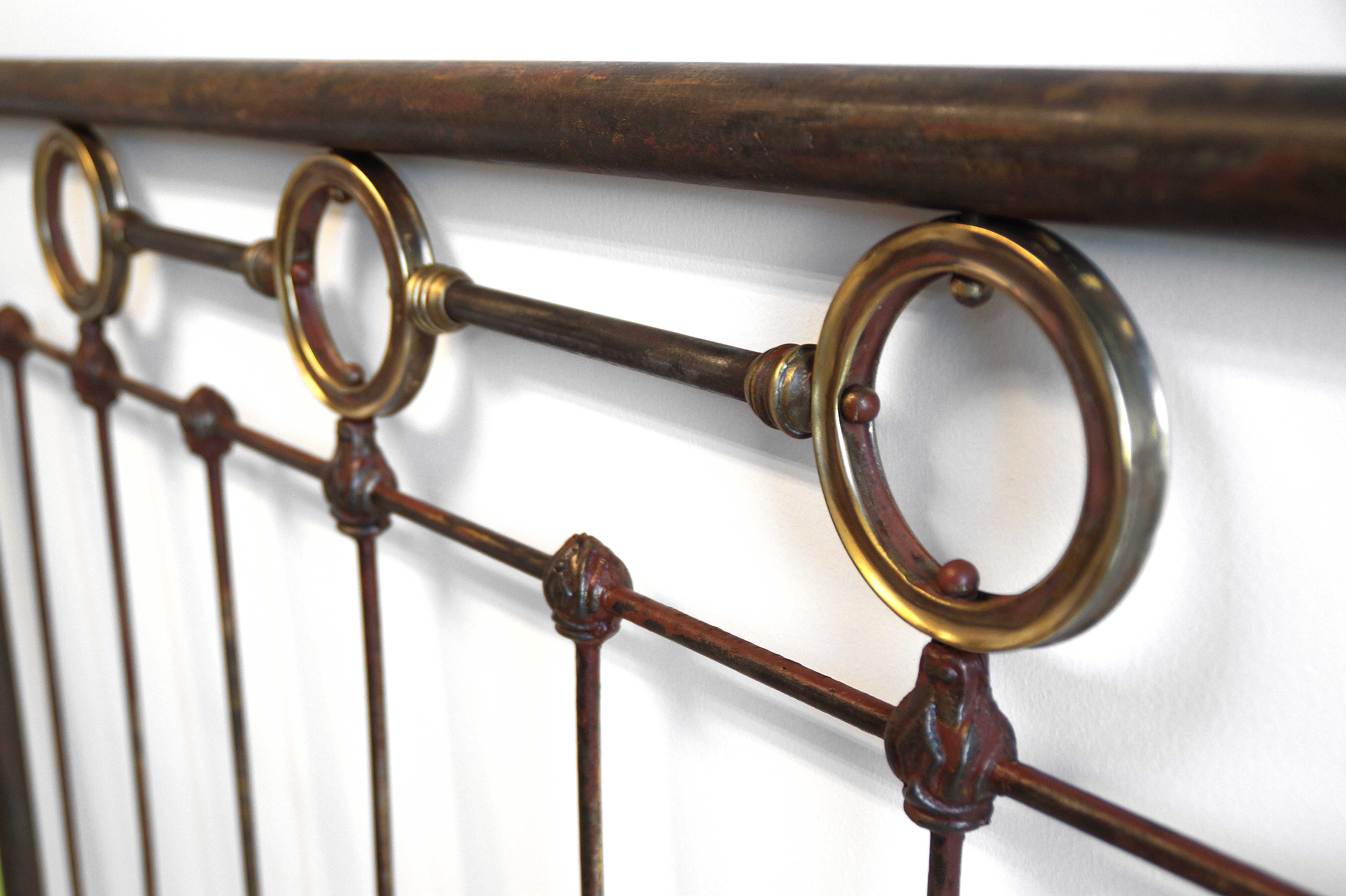 Iron and brass headboard