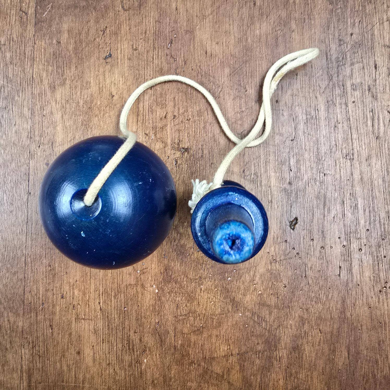 Antique navy blue wooden cup-and-ball toy – Vintage skill toy