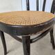 Chaise de salle à manger vintage style Thonet en bois noir et assise en cannage 1970