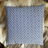 Blue cushion with royal pattern