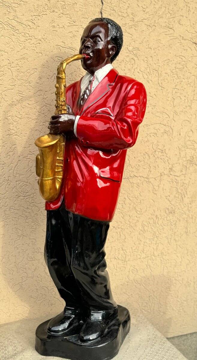 Large black and red jazz figurine in fibreglass, decorative sculpture from the 1960s.