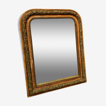 Mirror with moldings on the frame