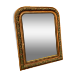 Mirror with moldings on the frame