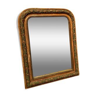 Mirror with moldings on the frame