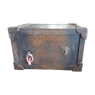 Old safe with his key