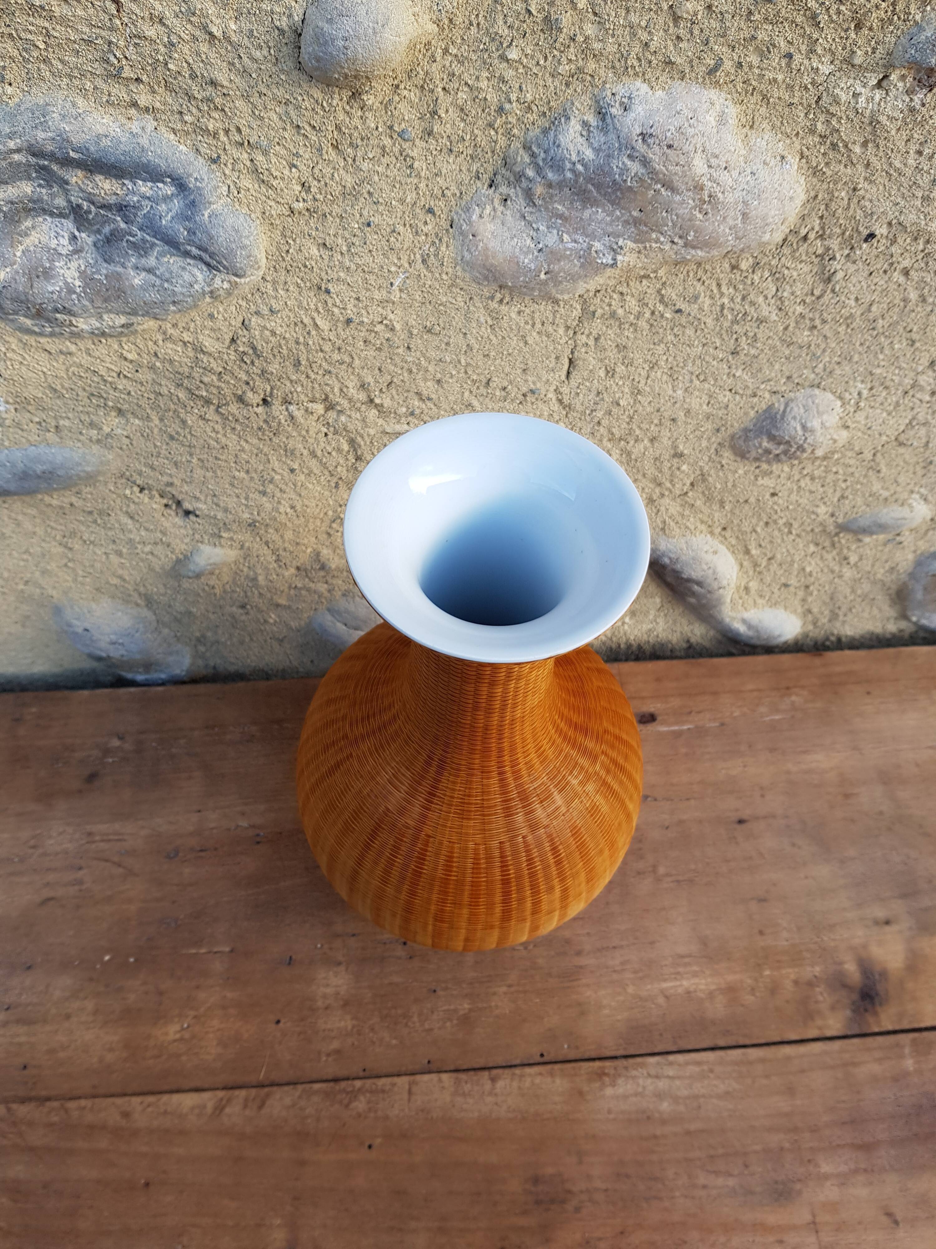 Woven straw vase