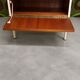 Small vintage rosewood piece of furniture – 60s/70s – metal base.
