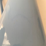Blue watering can
