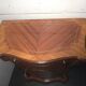 Small support table in Louis XV style with marquetry and bronze.
