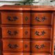 Semainier commode arbalète en bois galbé
