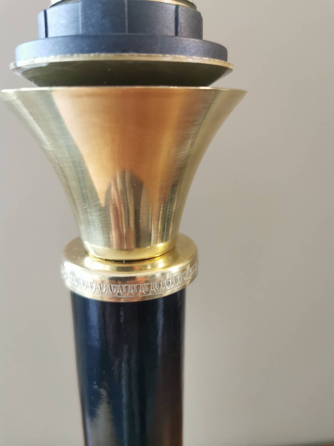 Vintage lamp base in black leather and brass