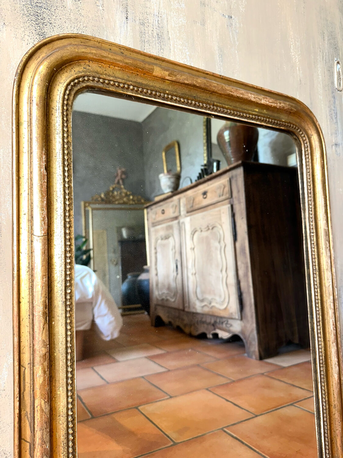 Antique Louis-Philippe gilded mirror from the 19th century