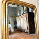 Antique Louis-Philippe gilded mirror from the 19th century