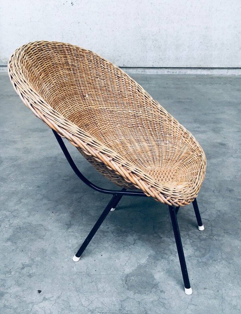 Wicker lounge chair in the style of Dirk Van Sliedregt for Rohé Noordwolde, Netherlands, 1960s.