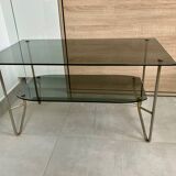 1975 glass coffee table with 2 tops, good condition