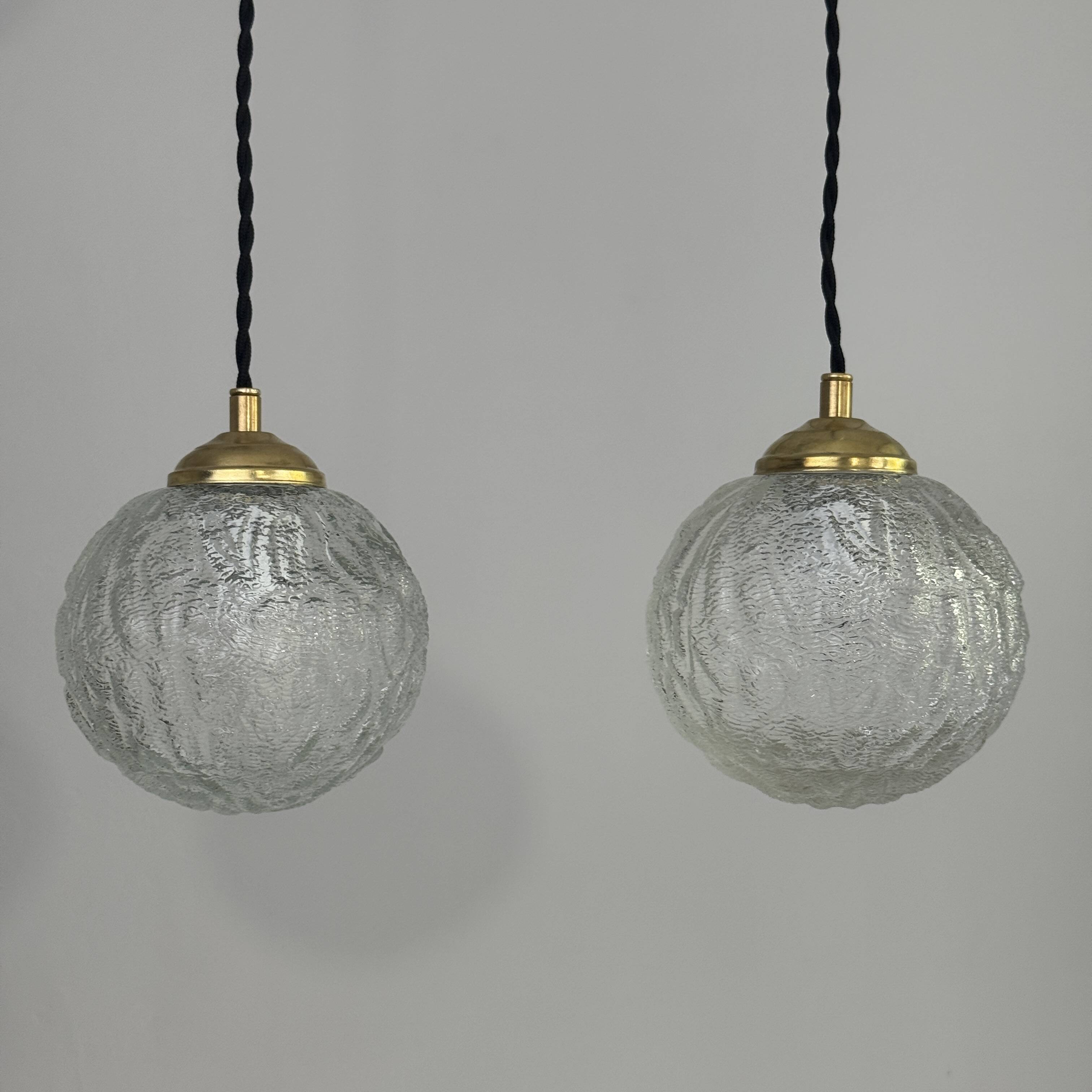 Pair of vintage round glass suspensions