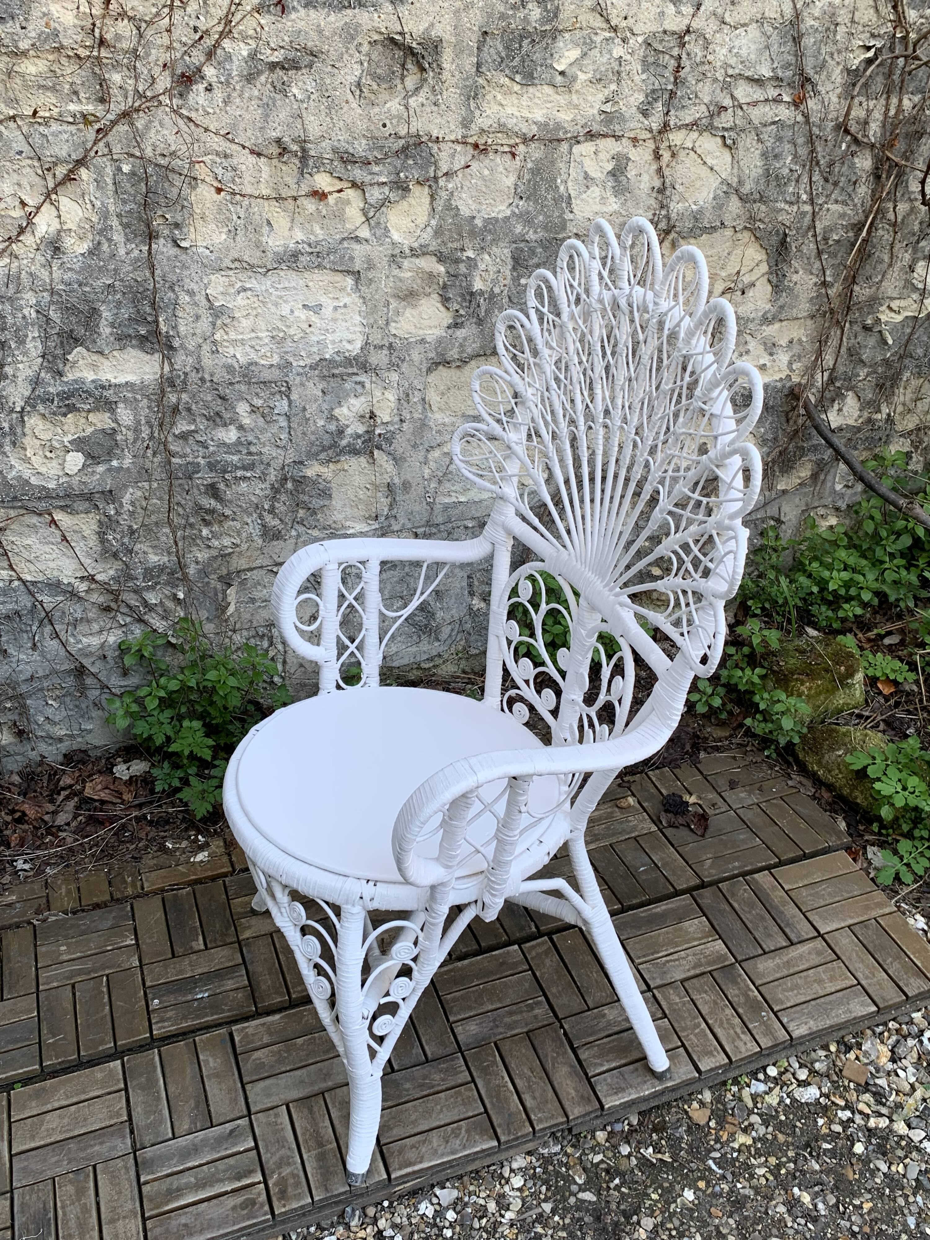 Emmanuelle Peacock white rattan armchair 1970