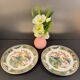 Two Raynaud Limoges plates and Tetard brothers silver.