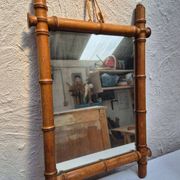 Vintage wooden mirror imitating bamboo