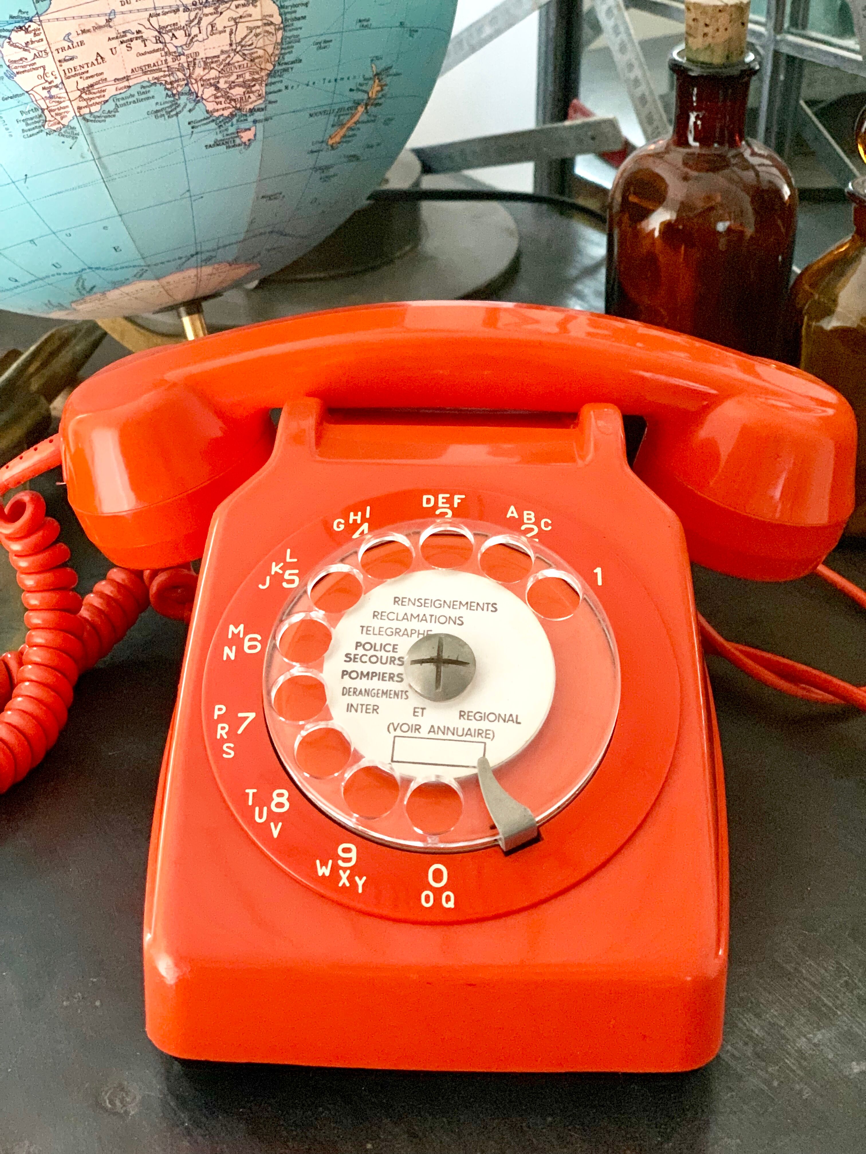 Old orange vintage dial phone