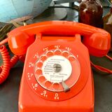 Old orange vintage dial phone