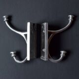 Pair of vintage cast aluminum coat hooks