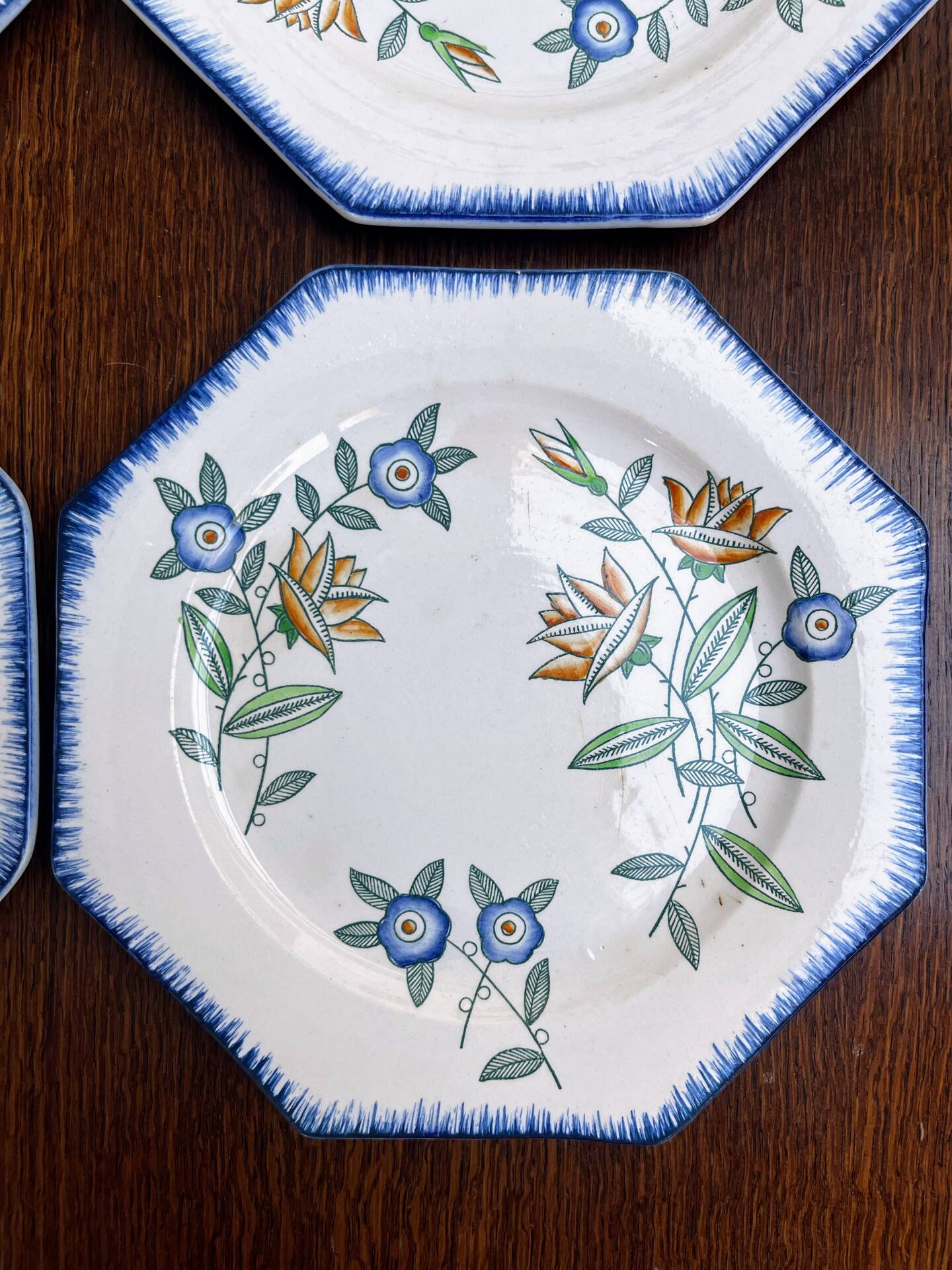 Set of 4 antique Longwy starter or dessert plates.