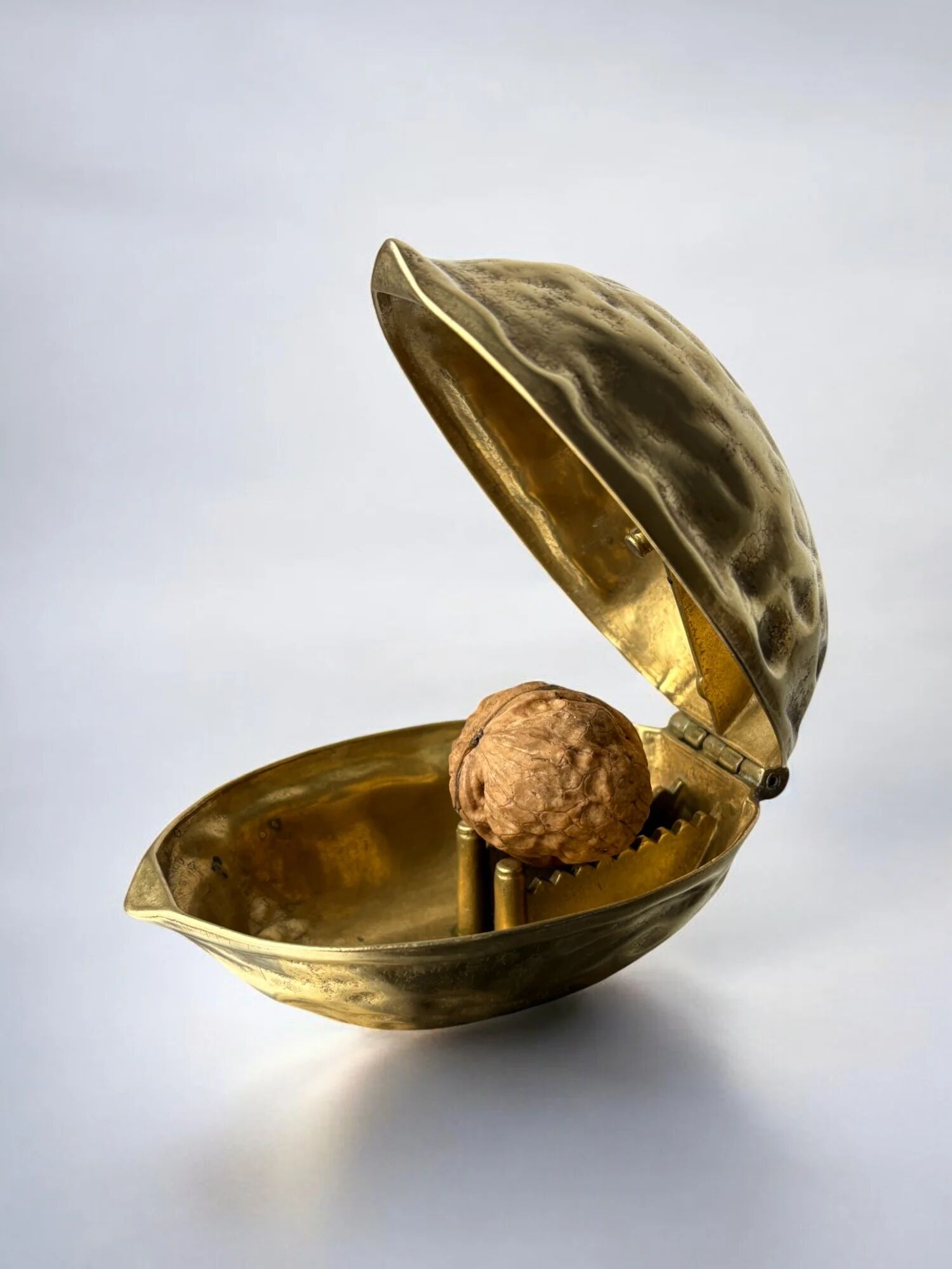 Walnut shaped nutcracker in brass, Italy 1970s